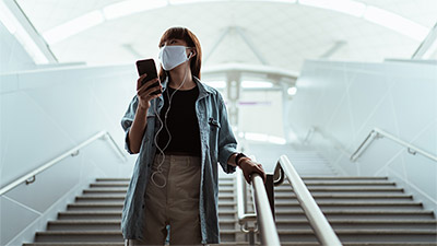 Lady holding on to her mobile phone